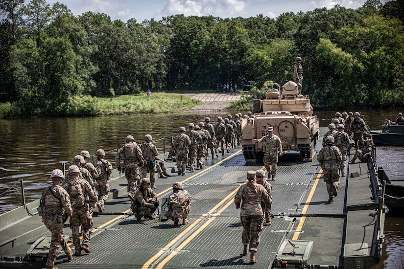 Engineers conduct floating bridge operations at Camp Ripley