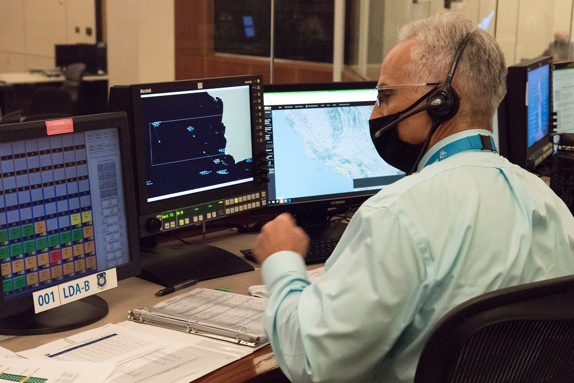 Ronald B. Cortopassi, 30th Space Wing executive director, participates in pre-launch operations, while training to become the director of launch operations at Vandenberg Air Force Base, Calif., Oct. 29, 2020. Cortopassi was the first civilian, at Vandenberg AFB, to become the launch decision authority during an active launch operation. (U.S. Air Force photo by Tech. Sgt. Brittany E. N. Murphy)