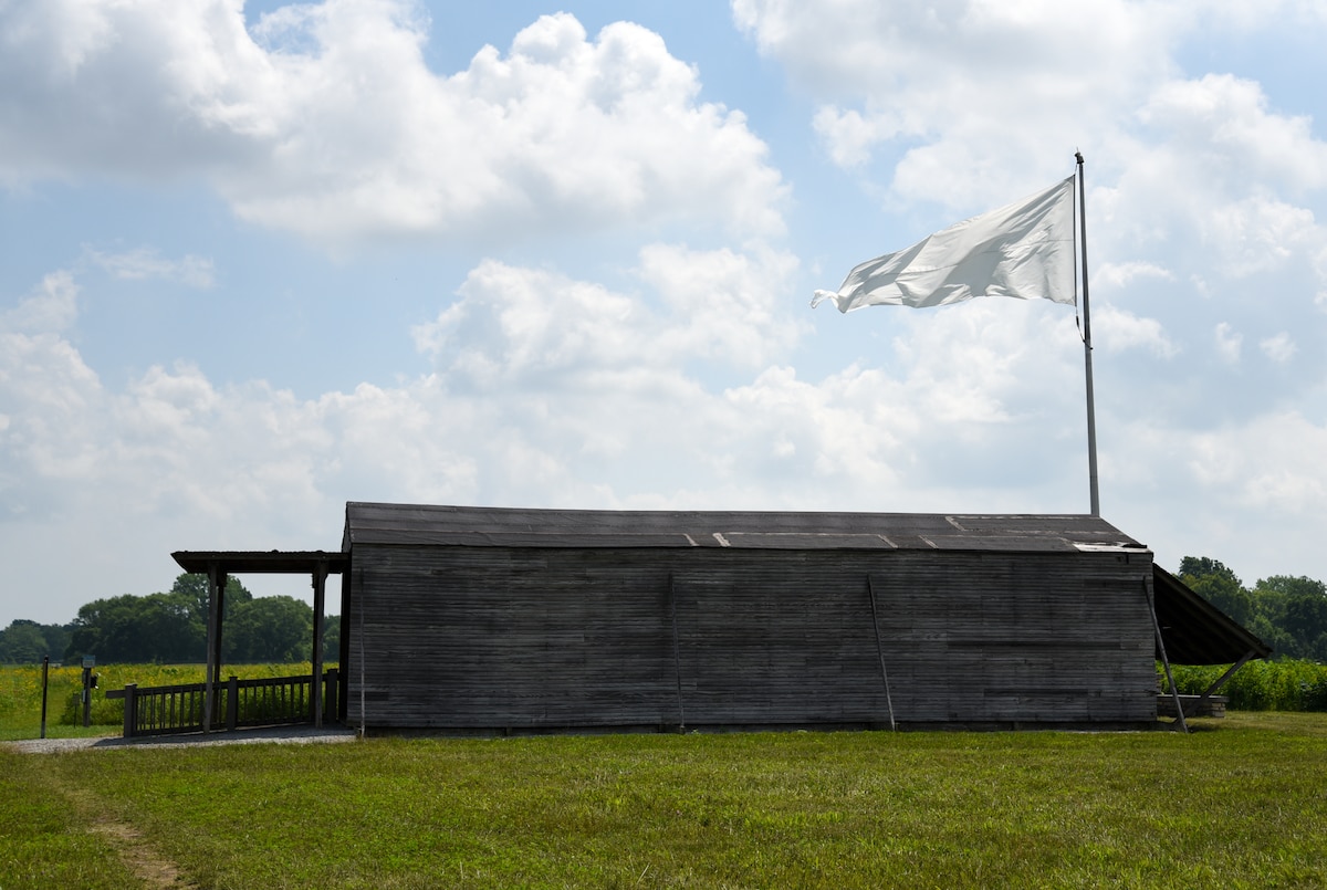 A replica of the Wright brothers' 1905 hangar on Huffman Prairie Flying Field sits in the exact location to commemorate their early aviation accomplishments, Wright-Patterson Air Force Base, Ohio, July 20, 2022. The field is where the brothers perfected flight and flew the first turn, circle and figure eight.