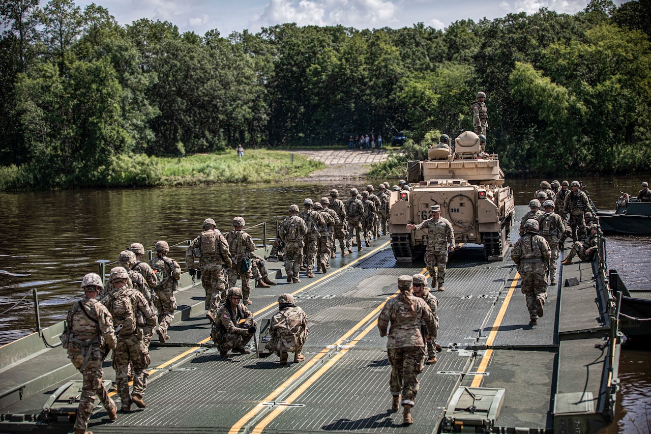 Engineers conduct floating bridge operations at Camp Ripley