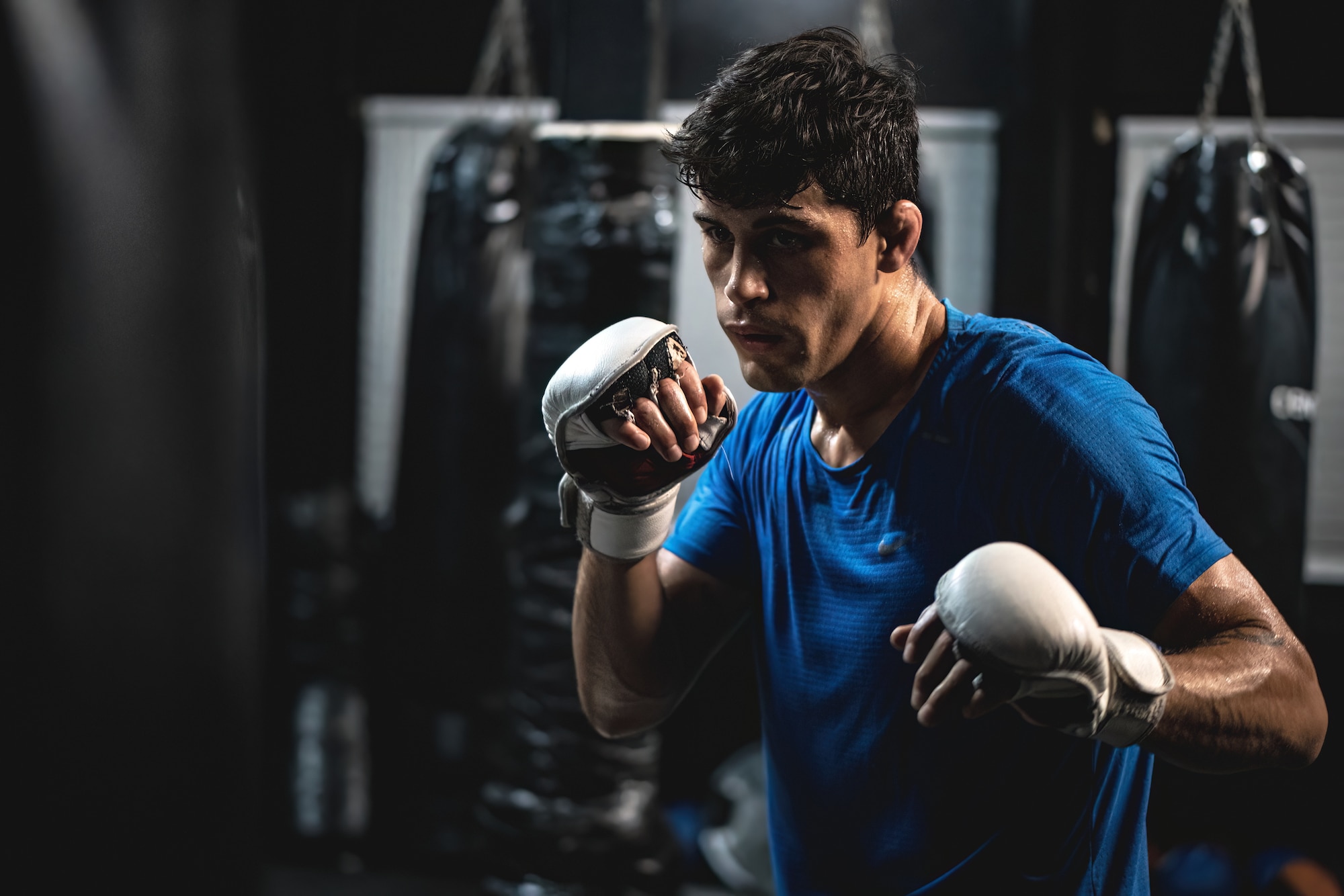 U.S. Air Force Senior Airman Adam Amado, 6th Maintenance Group aircraft maintenance unit scheduler, trains at a boxing gym in Tampa, Florida, July 11, 2022.