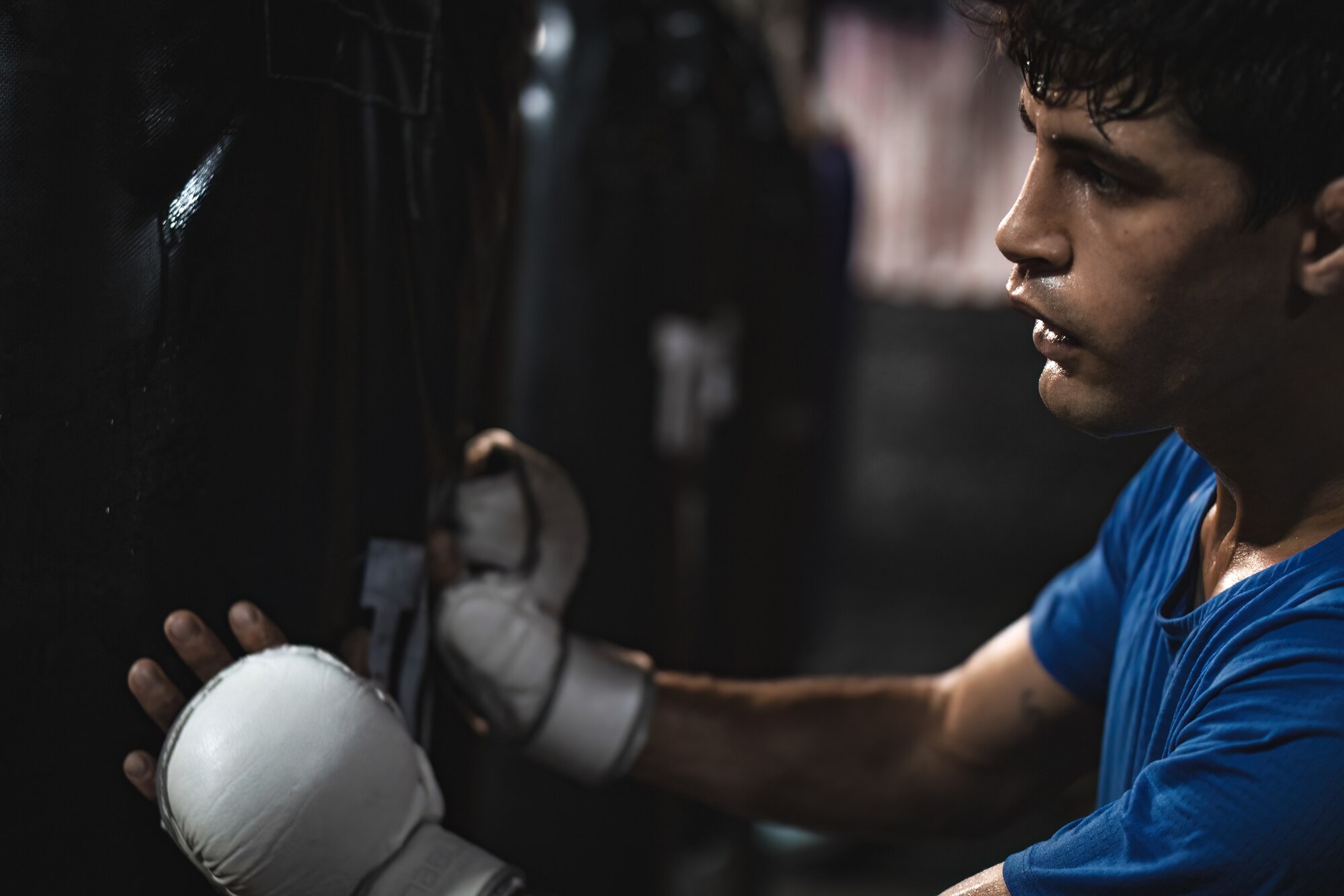 U.S. Air Force Senior Airman Adam Amado, 6th Maintenance Group aircraft maintenance unit scheduler, trains at a boxing gym in Tampa, Florida, July 11, 2022.