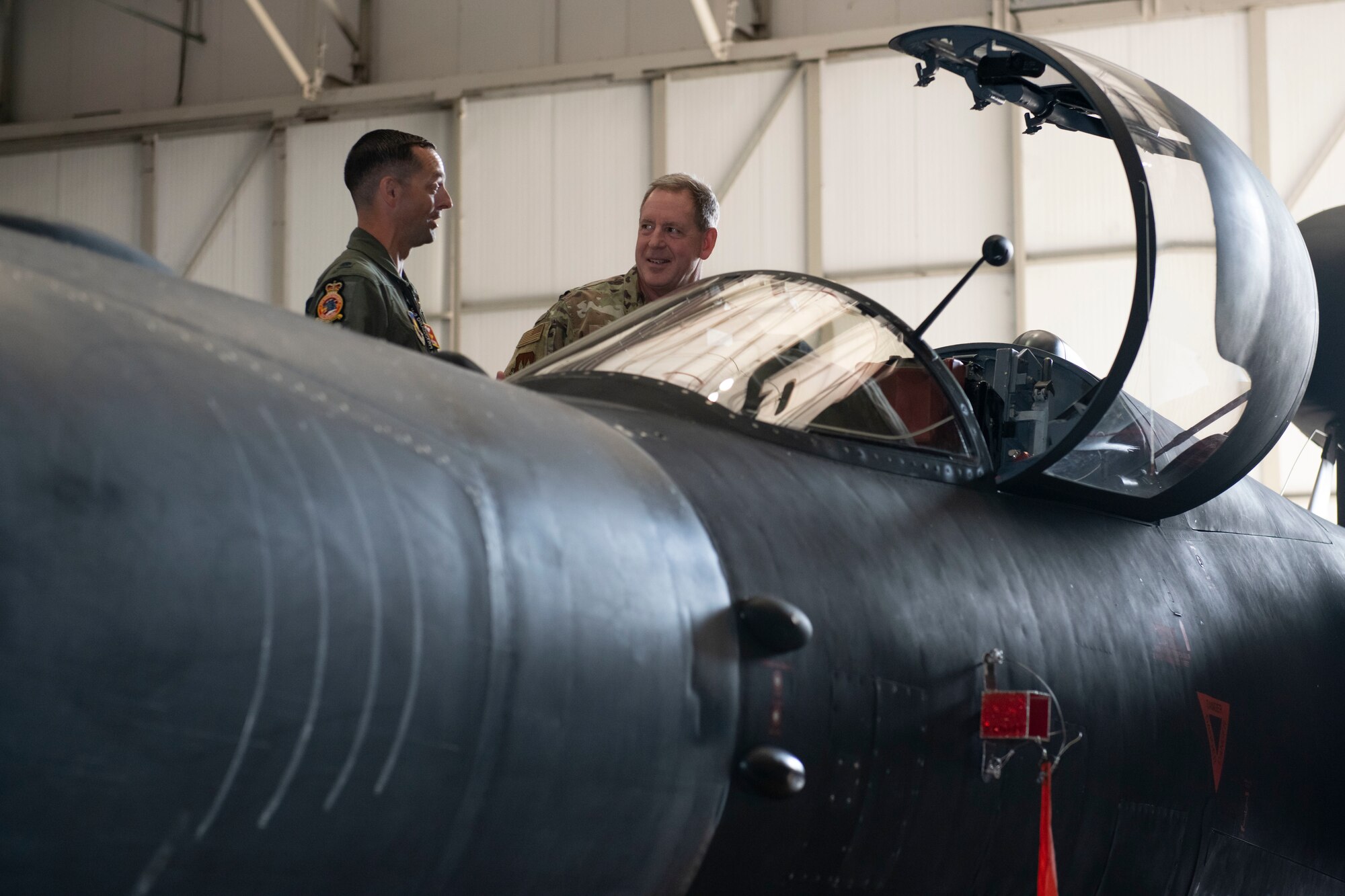 U.S. Air Force Lt. Col. Christopher “Scrat” Pridgen, left, 99th Expeditionary Reconnaissance Squadron director of operations, provides a tour of the U-2 Dragon Lady to Gen. James B. Hecker, right, U.S. Air Forces in Europe and Air Forces Africa commander, recognizes  at Royal Air Force Fairford, England, July, 18, 2022. During his first visit to the 501st Combat Support Wing as the USAFE-AFAFRICA commander, Hecker met with several Airmen and received briefings about the wing’s mission and capabilities. (U.S. Air Force photo by Senior Airman Jennifer Zima)