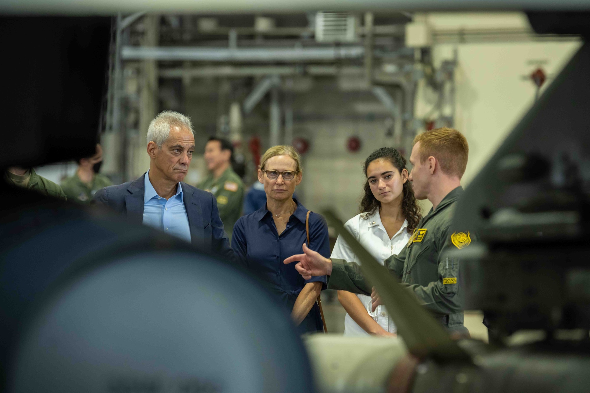 Rahm Emanuel, U.S. Ambassador to Japan, listens to a U.S. Air Force Airman brief about the F-16 Fighting Falcon during the ambassador’s visit at Misawa Air Base, Japan, July 22, 2022.