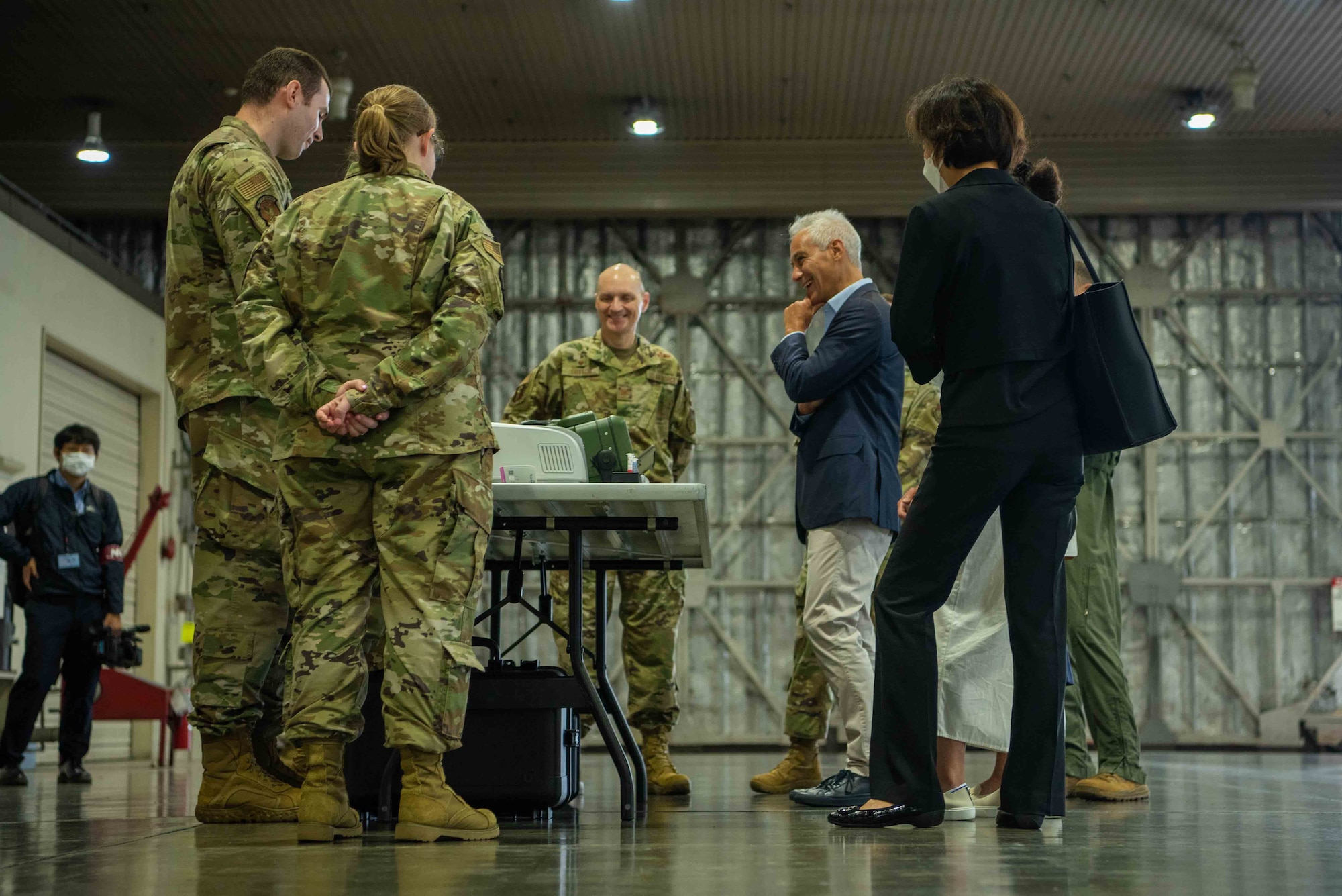 Rahm Emanuel, U.S. Ambassador to Japan, talks with U.S. Air Force Airmen during the ambassador’s visit at Misawa Air Base, Japan, July 22, 2022.