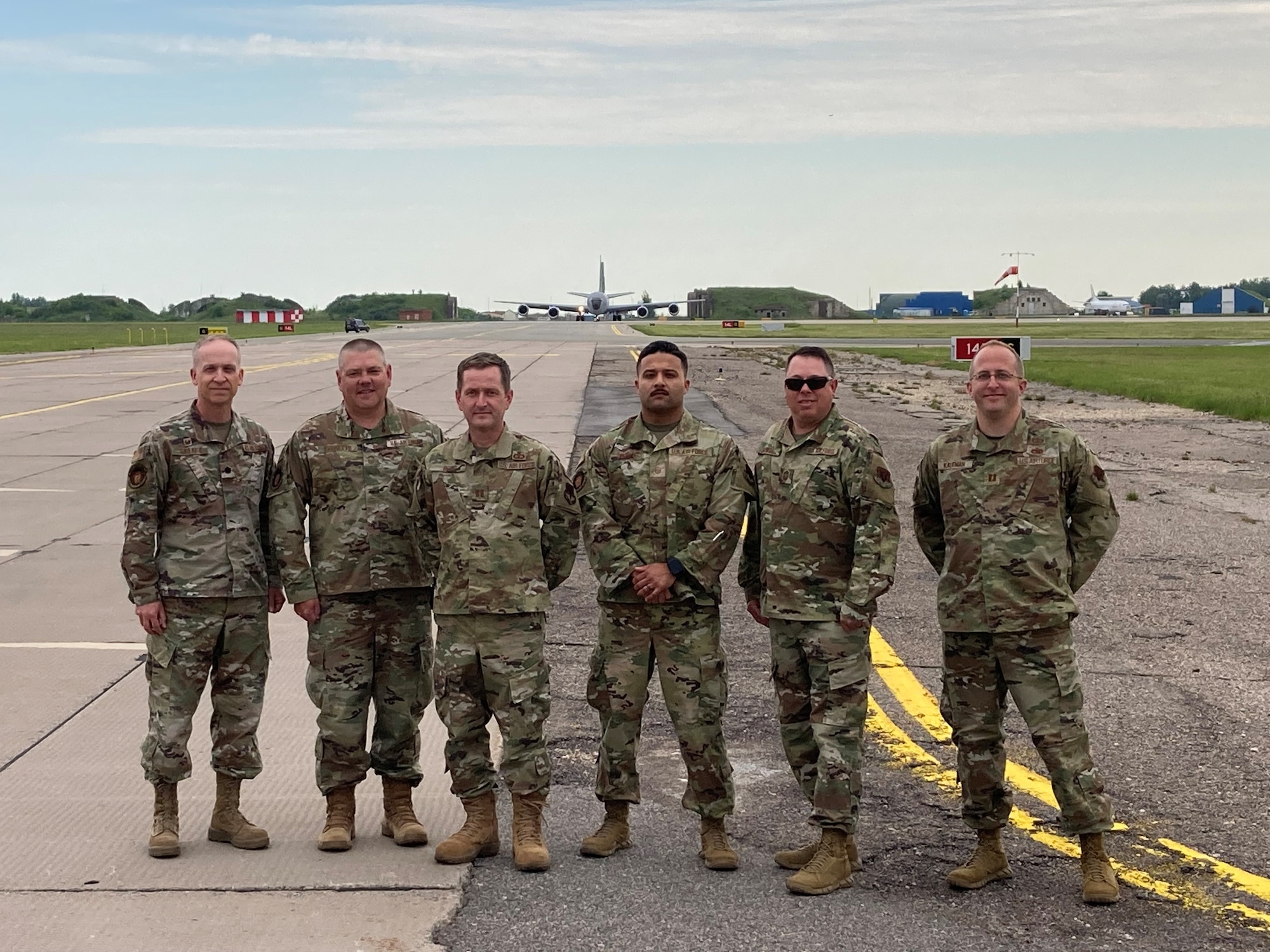 From left, Pennsylvania Air National Guard Lt. Col. Frank Shoaf, Chief Master Sgt. Jason Everetts, Capt. Matthew Reed, Master Sgt. Frankie Perez, Chief Master Sgt. Andrew Mowry and Capt. Benjamin Kaufman with the 171st Air Refueling Wing’s 258th Air Traffic Control Squadron at Siauliai Air Base, Lithuania, during the Defender Europe 22 exercise, June 2022. The Pennsylvania Guard and Lithuania are partners under the Department of Defense National Guard Bureau State Partnership Program.