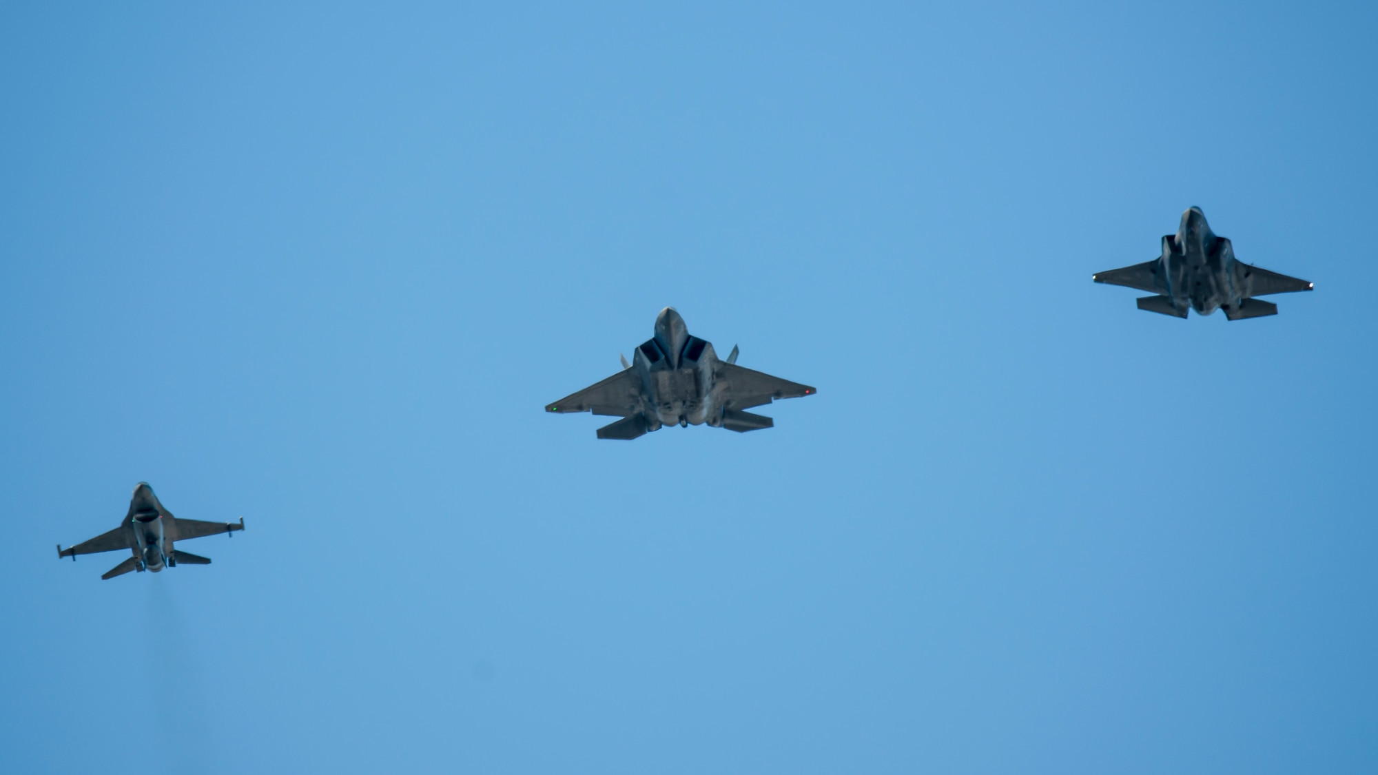 An F-16 Fighting Falcon, F-22 Raptor and F-35 Lightning II conduct a flyover during the opening ceremony of the 2022 MLB All-Star Game at Dodger Stadium in Los Angeles, California, July 19. (Air Force photo by Madeline Guadarrama)