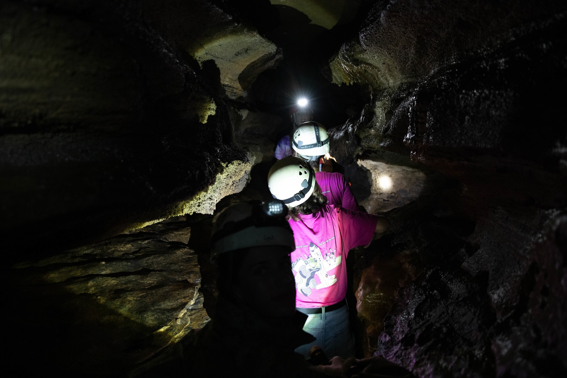 Campers expore the cave at the Kentucky National Guard (KYNG) Child and Youth Camp at the Lake Cumberland 4-H Camp in Nancy, Ky. on July 18-22, 2022. The cave's tempature stays at a consistant mid 50's year long. (U.S. Army phot by Pfc. Georgia Napier)