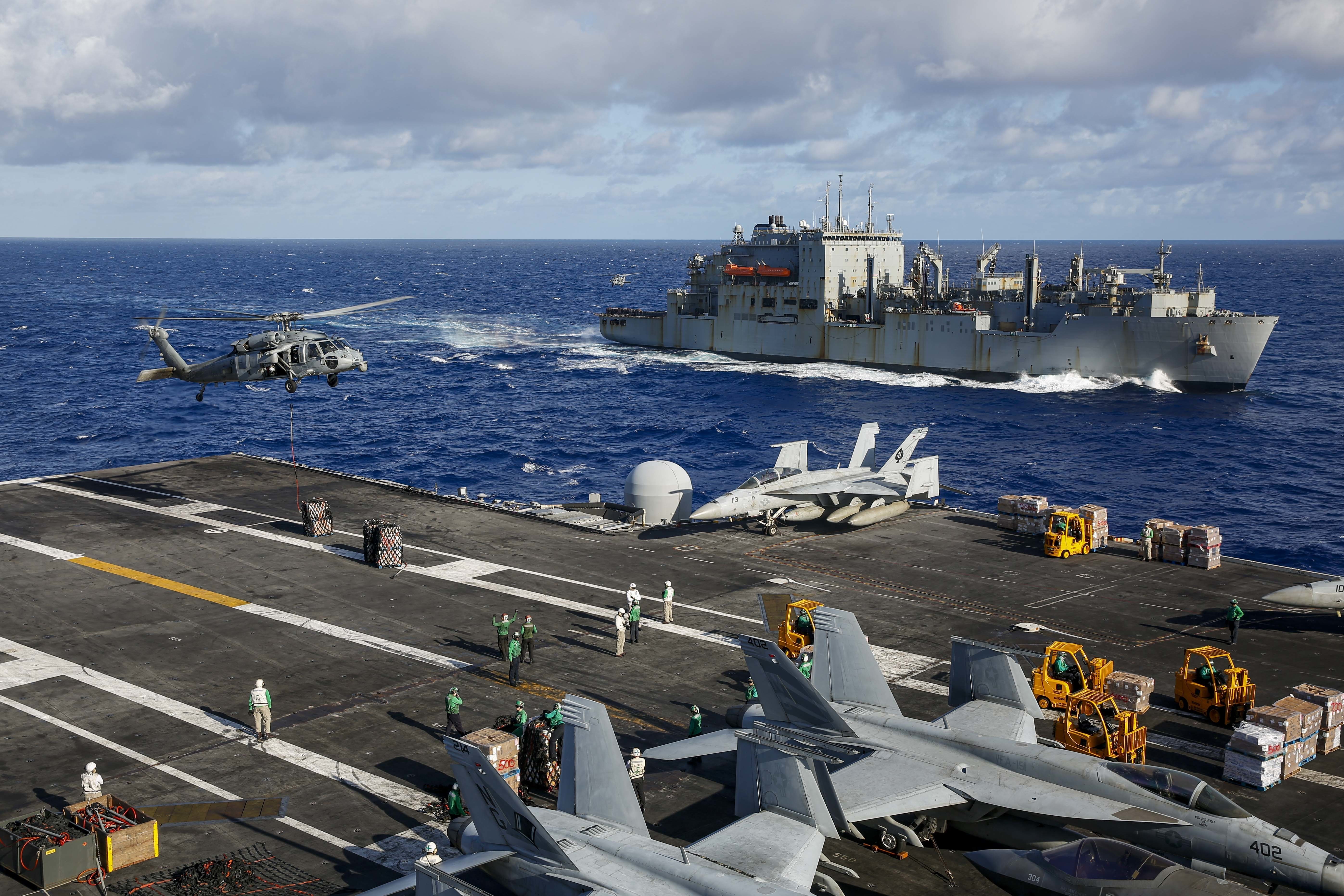 USS Abraham Lincoln (CVN 72) is underway with USNS Washington Chambers (T-AKE 11) during Rim of the Pacific (RIMPAC) 2022.