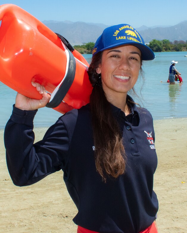 LA County Parks and Recreation Senior Lifeguard Brittany Orduño, poses for photos during joint safety video production in Santa Fe Dam Recreational Park June 1 in LA County.