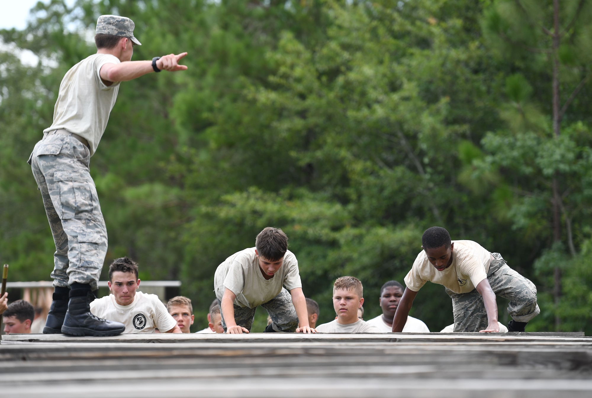 Louisiana Civil Air Patrol cadets participate in an obstacle course at Harrison Central High School at Gulfport, Mississippi, July 22, 2022. More than 50 cadets attended the Louisiana Wing Encampment at Keesler Air Force Base, Mississippi, from July 14-24. (U.S. Air Force photo by Kemberly Groue)