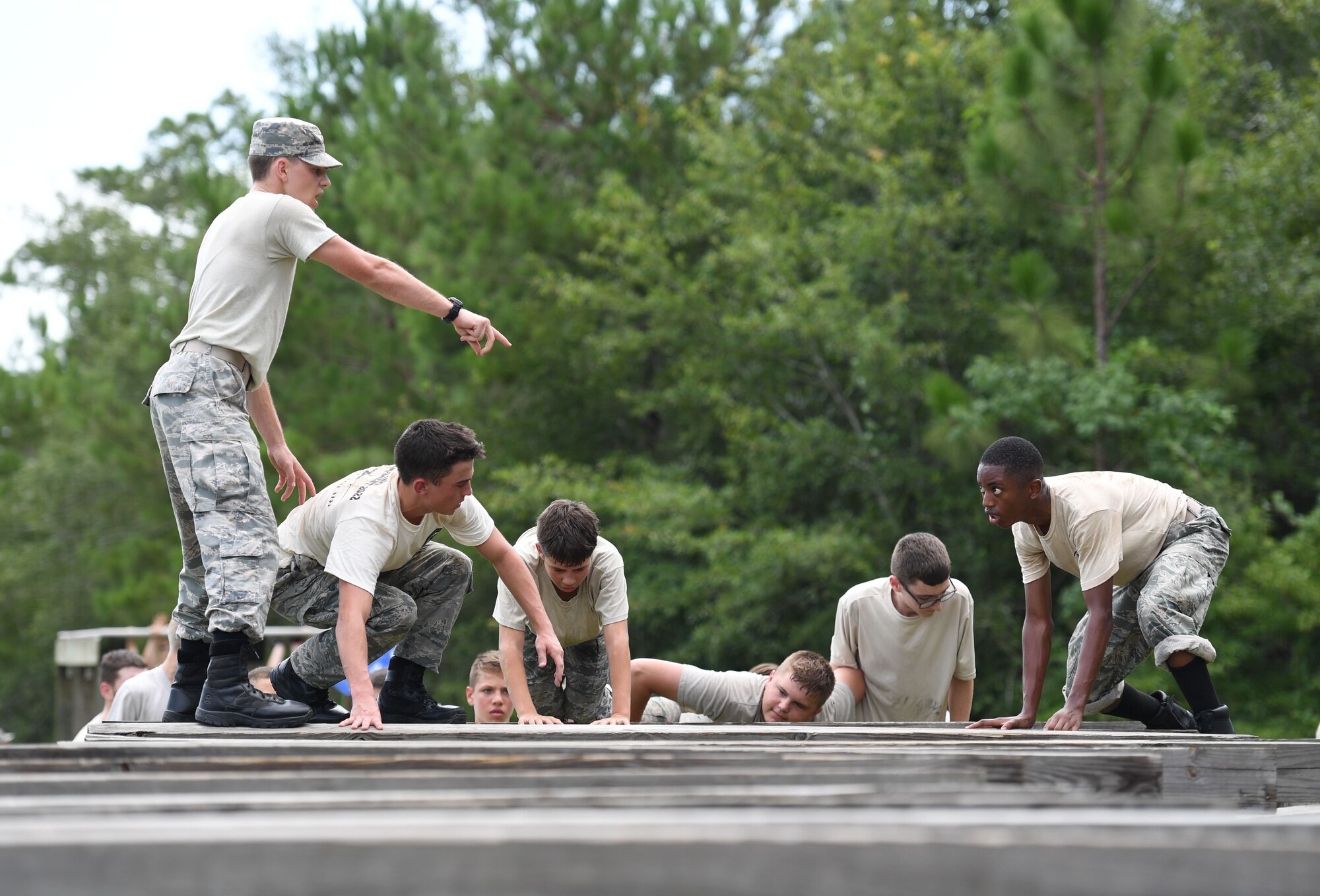 Louisiana Civil Air Patrol cadets participate in an obstacle course at Harrison Central High School at Gulfport, Mississippi, July 22, 2022. More than 50 cadets attended the Louisiana Wing Encampment at Keesler Air Force Base, Mississippi, from July 14-24. (U.S. Air Force photo by Kemberly Groue)