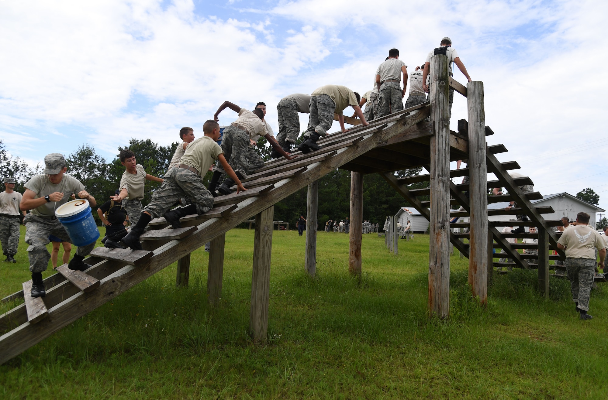 Louisiana Civil Air Patrol cadets participate in an obstacle course at Harrison Central High School at Gulfport, Mississippi, July 22, 2022. More than 50 cadets attended the Louisiana Wing Encampment at Keesler Air Force Base, Mississippi, from July 14-24. (U.S. Air Force photo by Kemberly Groue)