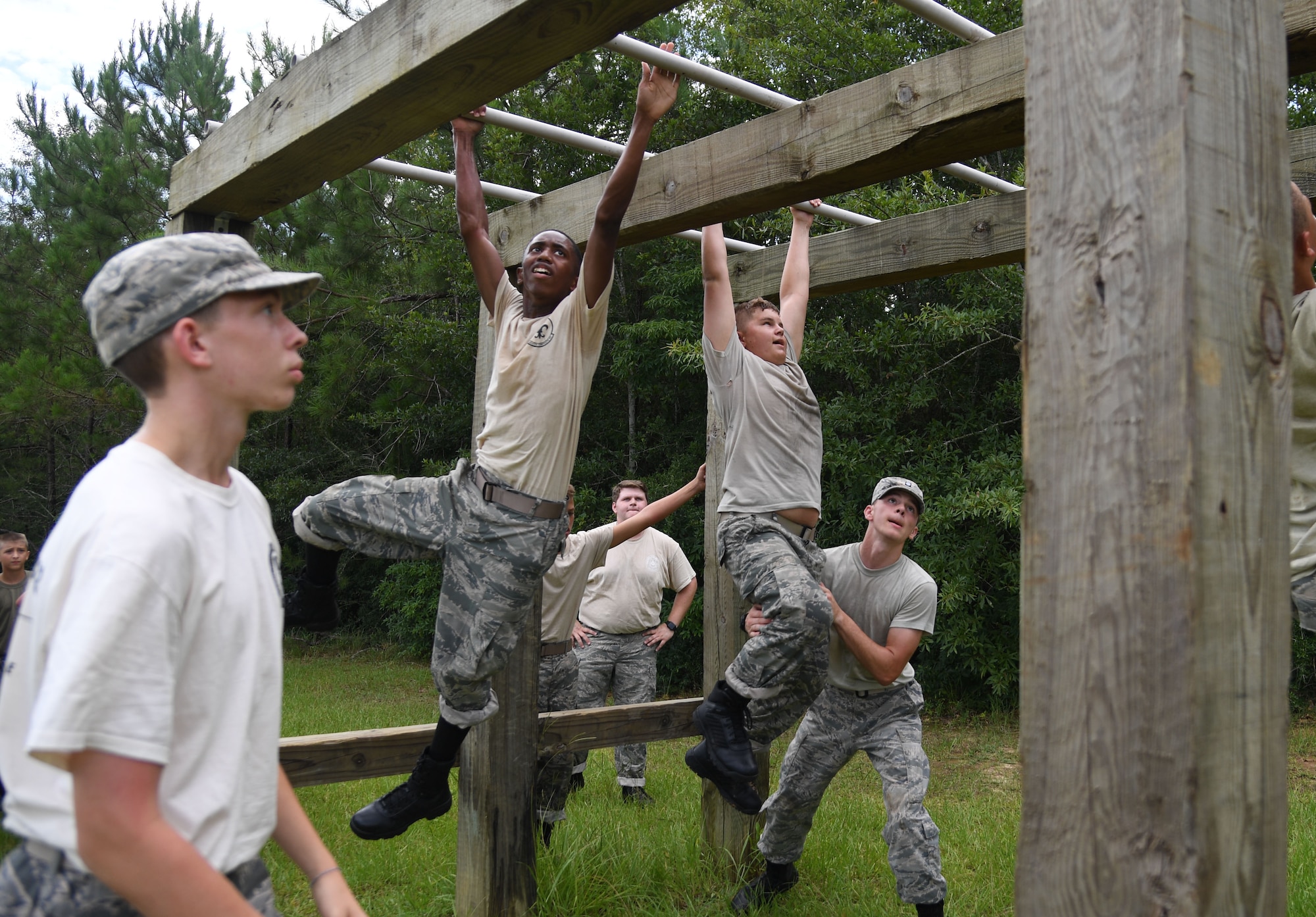 Louisiana Civil Air Patrol cadets participate in an obstacle course at Harrison Central High School at Gulfport, Mississippi, July 22, 2022. More than 50 cadets attended the Louisiana Wing Encampment at Keesler Air Force Base, Mississippi, from July 14-24. (U.S. Air Force photo by Kemberly Groue)