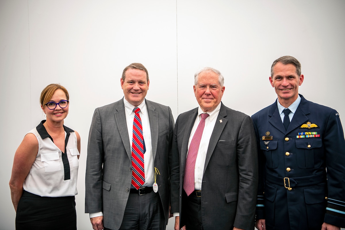 Kelli Seybolt, deputy under secretary of the Air Force, International Affairs; Andrew Hunter, assistant secretary of the Air Force for Acquisition, Technology and Logistics; Secretary of the Air Force Frank Kendall, and Air Marshal Robert Chipman, Royal Australian Air Force Chief of Air Force, pose for a photo during the Royal International Air Tattoo at RAF Fairford, United Kingdom, July 16, 2022. Kendall attended RIAT to meet with air and space chiefs and defense officials from other nations and demonstrate the Department of the Air Force's commitment to its allies and partners. (U.S. Air Force photo by Staff Sgt. Eugene Oliver)