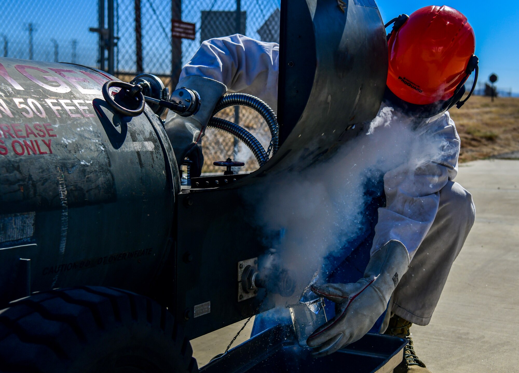 Airman 1st Class Randy Willis 9th Logistic Readiness Squadron cryogenics technician, carefully adjust knobs and handles Liquid Oxygen (LOX) at Beale Air Force Base, California, July 21, 2022.