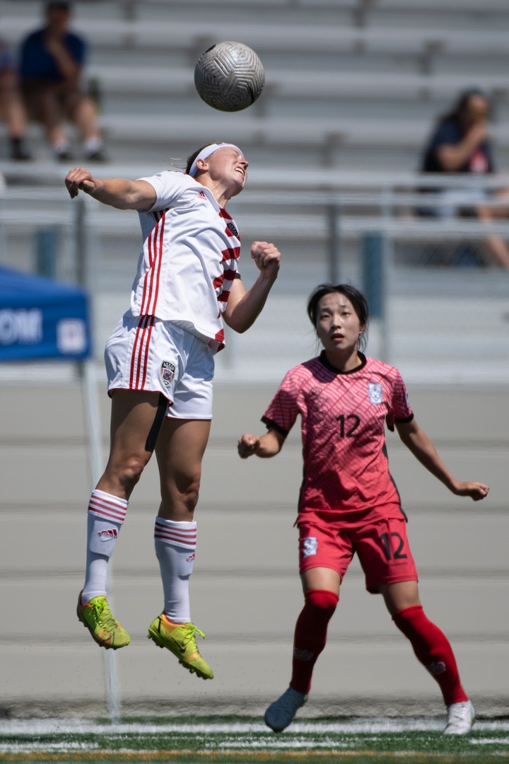 U.S. Marine Corps Lt. Katie Gernsbacher heads a ball during the bronze medal match against South Korea in the 13th CISM (International Military Sports Council) World Military Women’s Football Championship in Spokane, Washington July 22, 2022. (DoD photo by EJ Hersom)