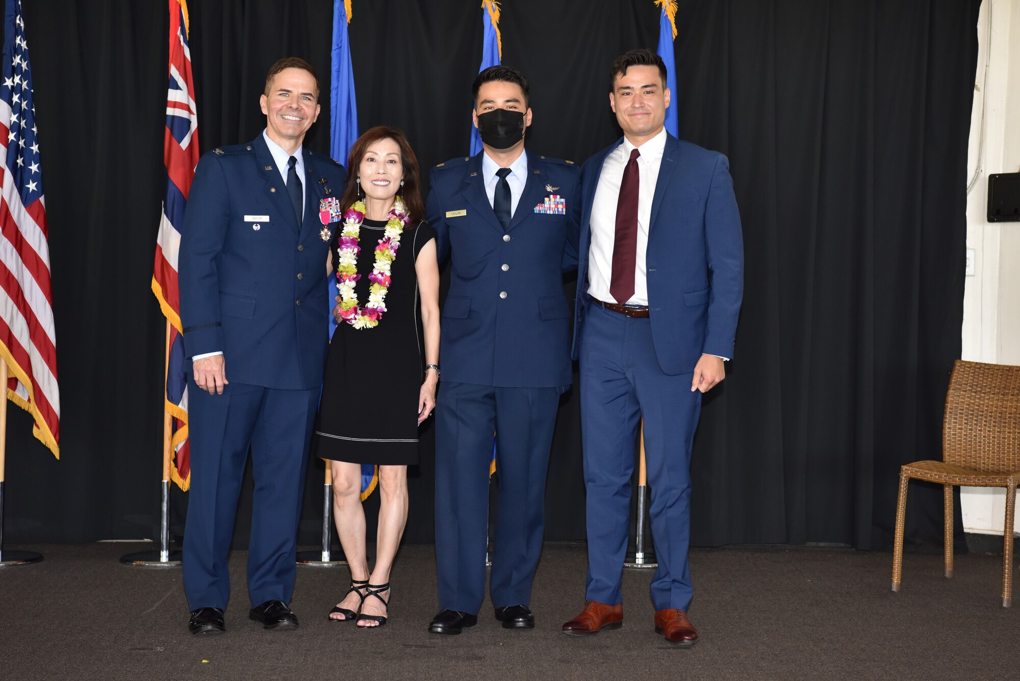 From left to right, U.S. Air Force Col. Ralph “Eddie” Taylor, Pacific Air Forces director of Manpower, Personnel and Services, his wife Nani Taylor, his son Maj. Vincent Taylor, 56th Air Communications Squadron director of Operations, and his son Austin Taylor, participate in Col. Taylor’s retirement ceremony at Joint Base Pearl Harbor-Hickam, Hawaii on July 15, 2022. Taylor’s retirement commemorated 38 years and 7 months of service, which was served between both enlisted and officer ranks. (U.S. Air Force photo by Master Sgt. Joshua Williams)