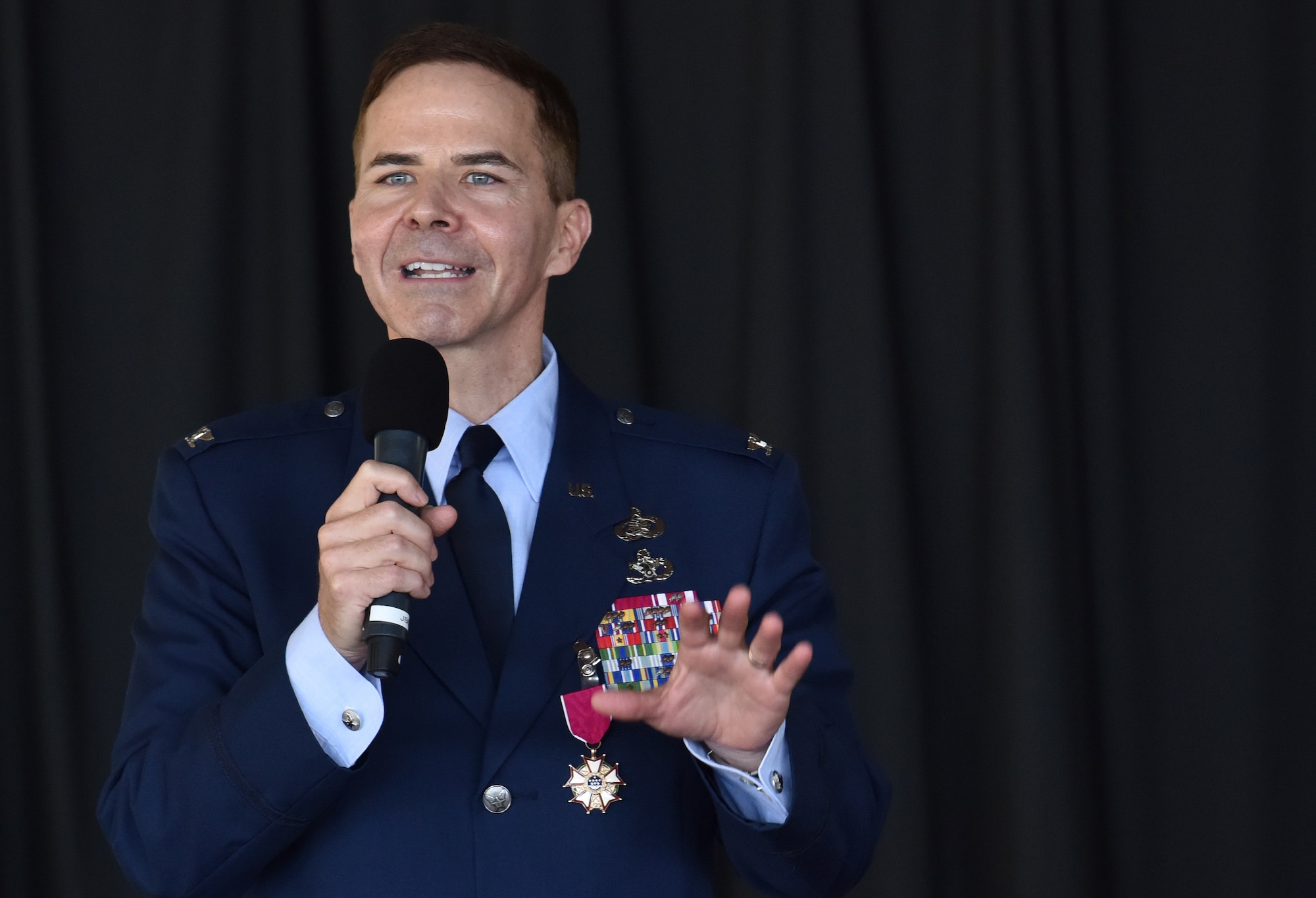 U.S. Air Force Col. Ralph “Eddie” Taylor, Pacific Air Forces director of Manpower, Personnel and Services, provides remarks at his retirement on Joint Base Pearl Harbor-Hickam, Hawaii, July 15, 2022. Eddie will have served 38 years and 7 months, from airman basic to colonel, upon his departure. During his service Eddie was able to serve twice with his son Maj. Vincent Taylor, 56th Air Communications Squadron director of Operations. (U.S. Air Force photo by Master Sgt. Joshua Williams)