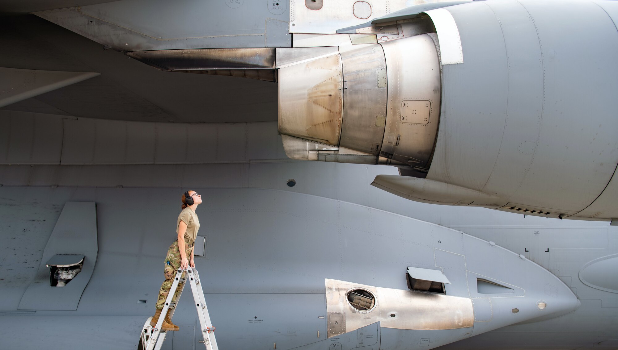 Senior Airman Grace Tupper, 172nd Maintenance Group crew chief, Jackson, Miss., inspects a C-17 Globemaster III engine