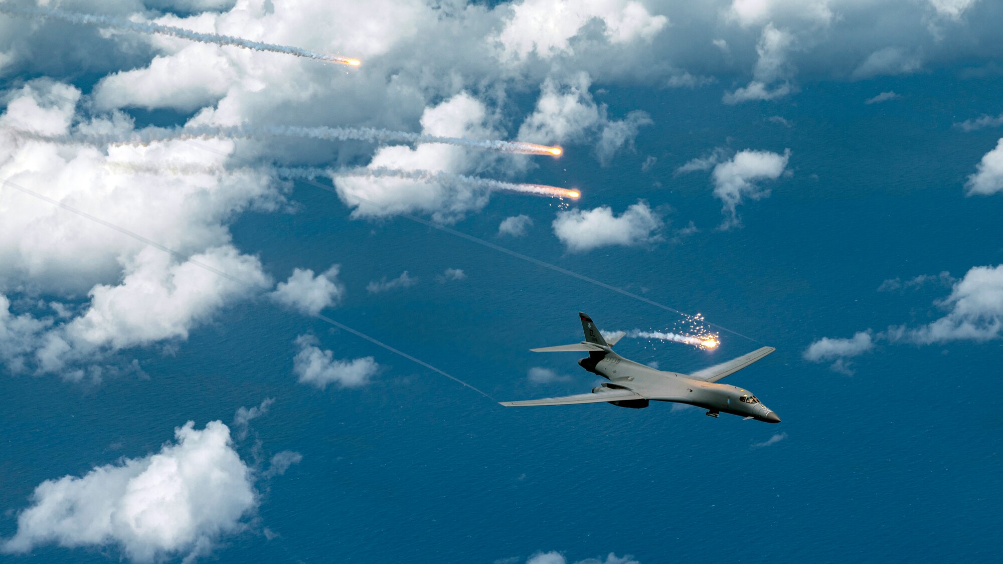 A U.S. Air Force B-1B Lancer, assigned to 34th Expeditionary Bomb Squadron, deploys flares