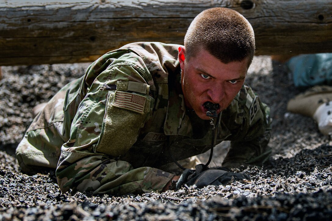 Basic Cadets from the Class of 2026 complete the obstacle course