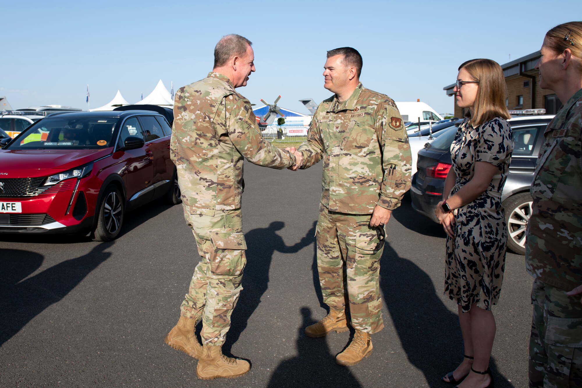 U.S. Air Force Col. Brian Filler, center right, 501st Combat Support Wing commander, greets Gen. James B. Hecker, left, U.S. Air Forces in Europe and Air Forces Africa commander, to Royal Air Force Fairford, England, July, 18, 2022. During his first visit to the 501st CSW as the USAFE-AFAFRICA commander, Hecker met with several Airmen and received briefings about the wing’s mission and capabilities. (U.S. Air Force photo by Senior Airman Jennifer Zima)
