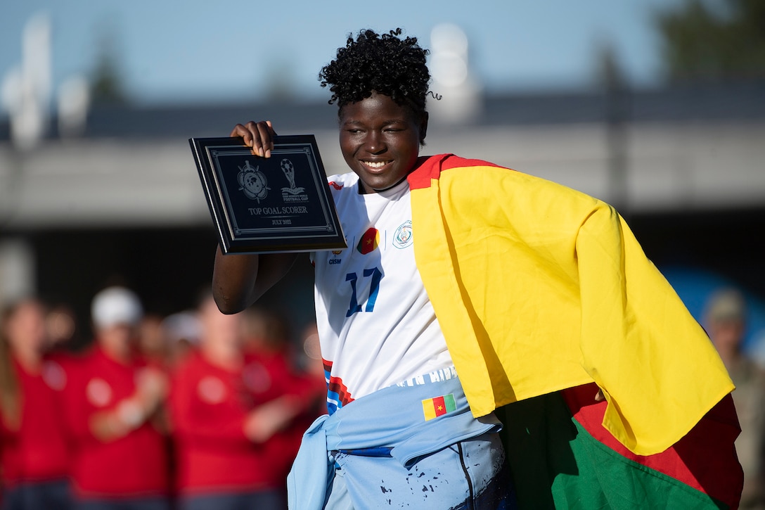 Cameroon’s Ebika Tabe reacts to being award the Top Goal Scorer Award in the 13th CISM (International Military Sports Council) World Military Women’s Football Championship in Meade, Washington July 22, 2022. (DoD photo by EJ Hersom)
