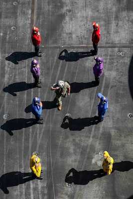 PACIFIC OCEAN (July 22, 2022) Chief of Naval Operations Adm. Mike Gilday salutes the side boys as he arrives aboard Nimitz-class aircraft carrier USS Abraham Lincoln (CVN 72) during Rim of the Pacific (RIMPAC) 2022. Twenty-six nations, 38 ships, four submarines, more than 170 aircraft and 25,000 personnel are participating in RIMPAC from June 29 to Aug. 4 in and around the Hawaiian Islands and Southern California. The world’s largest international maritime exercise, RIMPAC provides a unique training opportunity while fostering and sustaining cooperative relationships among participants critical to ensuring to safety of sea lanes and security on the world’s oceans. (U.S. Navy photo by Mass Communication Specialist 3rd Class Javier Reyes)