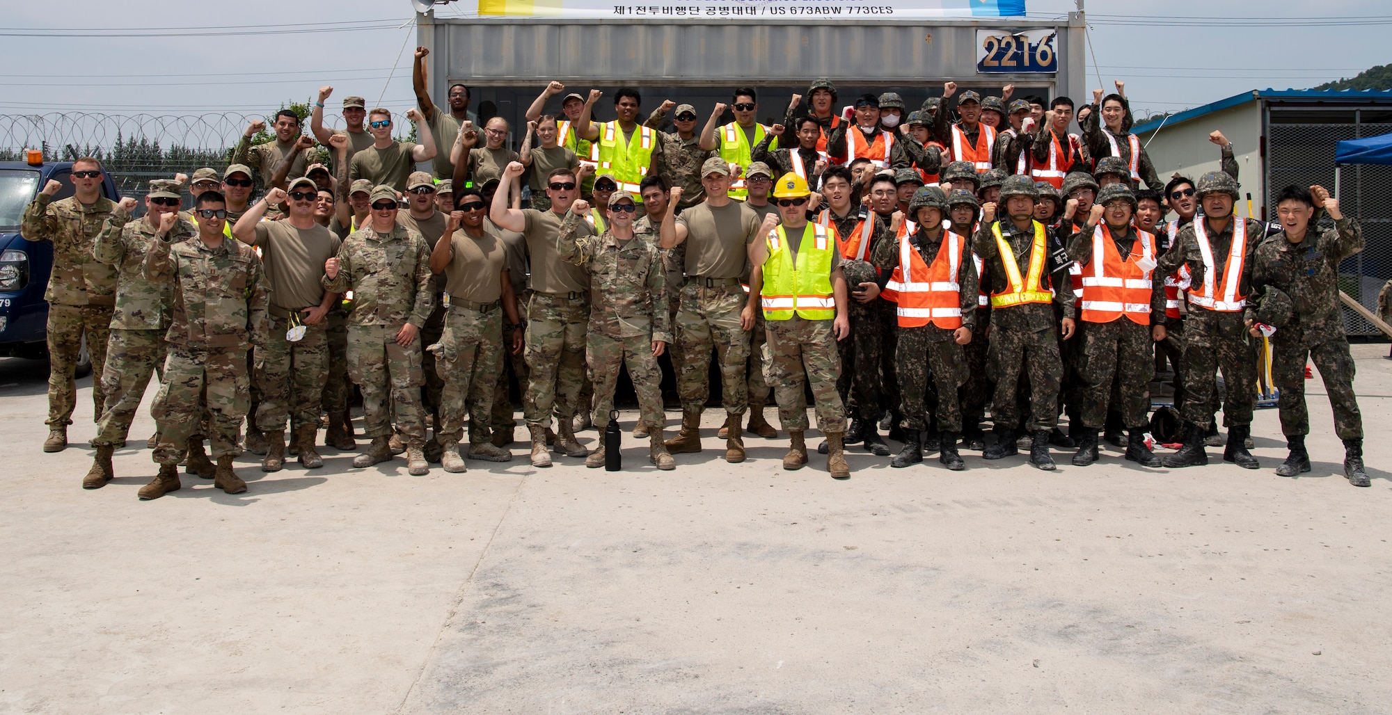 Civil Engineers from the United States Air Force (USAF) and Republic of Korea Air Force (ROKAF) stand for a group photo during a rapid airfield damage repair training, July 20, 2022 at Gwangju Air Base, Republic of Korea.