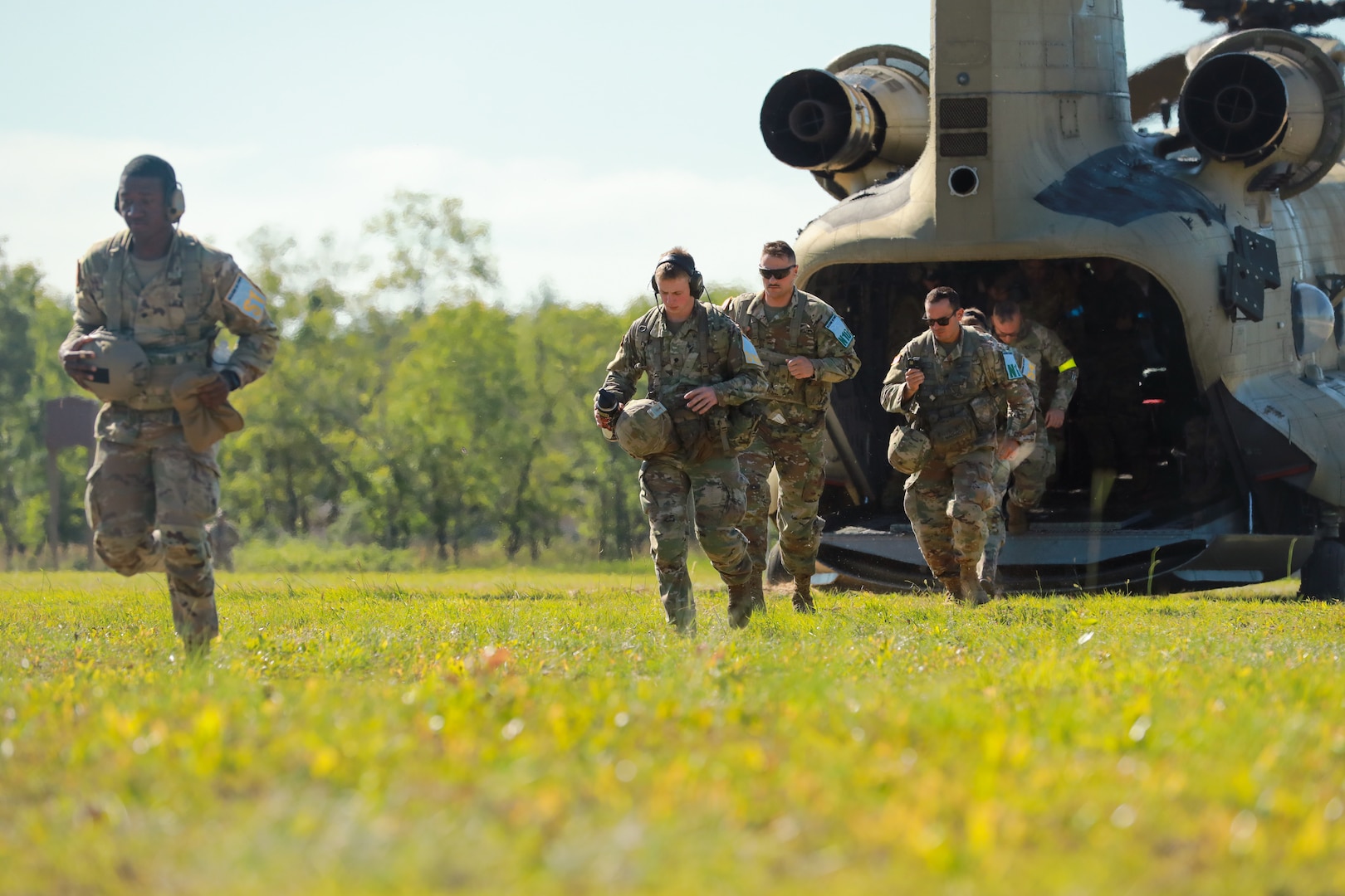 U.S. Army National Guard members exit a Boeing CH-47 Chinook during the Region III Best Warrior Competition on Camp Blanding, Fla., May 12, 2022. The Regional Best Warrior Competition highlights the lethality, readiness and capabilities of Army National Guardsmen throughout the southeastern region.