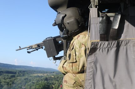 Pennsylvania Army National Guard Soldiers with Alpha Company, 2-104th General Support Aviation Battalion, train to pass air gunnery qualification at Fort Indiantown Gap, Pennsylvania, July 21, 2022. To be fully qualified, Soldiers must pass aircrew qualification tables four, five and six.