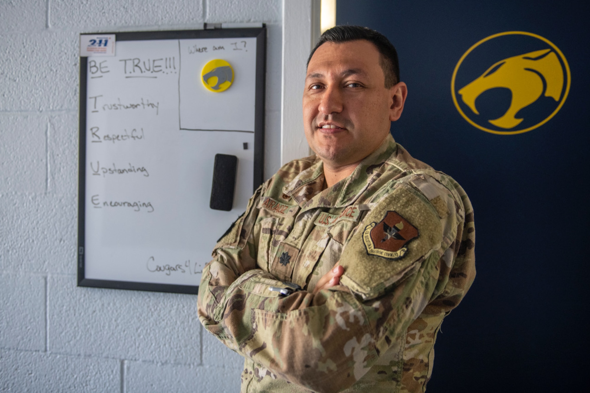 U.S. Air Force Lt. Col. Juan Araoz, 314th Training Squadron commander, poses for a photo in the 314th TRS building, Presidio of Monterey, California, July 13, 2022. Araoz plans to implement his “BE TRUE” mantra: being trustworthy, respectful, upstanding and encouraging. (U.S. Air Force photo by Leonardo Carrillo)