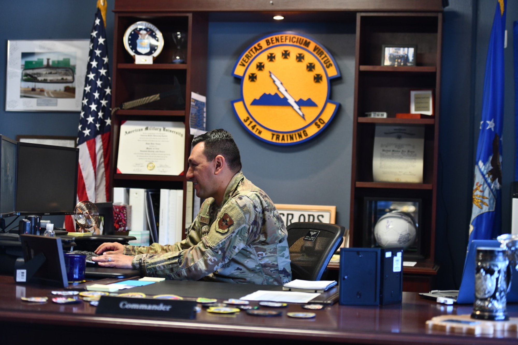 U.S. Air Force Lt. Col. Juan Araoz, 314th Training Squadron commander, sits at his desk at Presidio of Monterey, California, July 13, 2022. Having recently taken over command, Araoz plans to maintain the legacy of the 314th TRS while striving to find improvements where needed. (U.S. Air Force photo by Leonardo Carrillo)