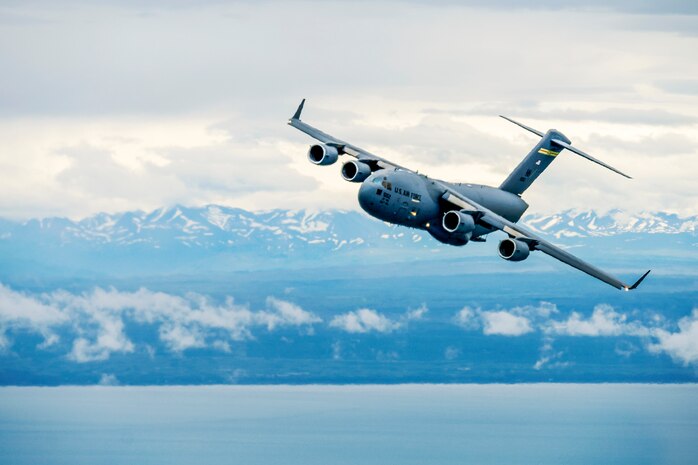 A U.S. Air Force C-17 Globemaster III based out of Joint Base Pearl Harbor-Hickam, Hawaii, and crewed by members of the 204th Airlift Squadron participates in exercise Amalgam Dart July 6, 2022, Joint Base Elmendorf-Richardson, Alaska. This iteration of the exercise featured a variety of military aircraft from the U.S. Air Force that operate out of the northern region.