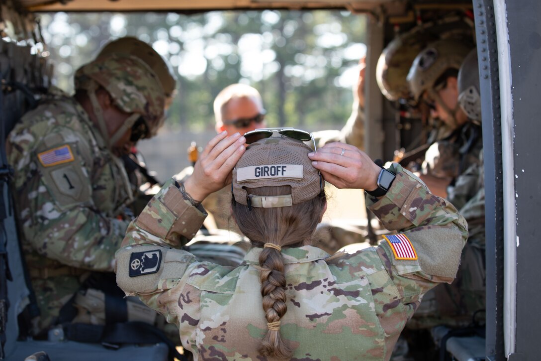 U.S. Army Soldiers with the 404th Civil Affairs Battalions (Airborne) aboard a Black Hawk (UH-60) helicopter during a cold load exercise with the 8th Battalion 229th regiment, during Operation Viking at Joint Base Cape Cod, Mass., July 20, 2022. Operation Viking is an intense joint task force exercise designed to prepare Soldiers with realistic training simulating deployment of civil affairs units in direct support of contigency operation in Africa. (U.S. Army photo by Sgt. Arbishua Rojas)