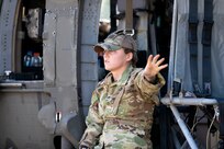 U.S. Army Sgt. Nichole Giroff with the 8th Battallion, 229th Regiment instructs Soldiers on a cold and hot load of a Black Hawk (UH-60) Helicopter during Operation Viking at Joint Base Cape Cod, Mass., July 20, 2022. Operation Viking is an intense joint task force exercise designed to prepare Soldiers with realistic training simulating deployment of civil affairs units in direct support of a contingency operation in Africa. (U.S. Army Photo by Staff Sgt. Keith Thornburgh)