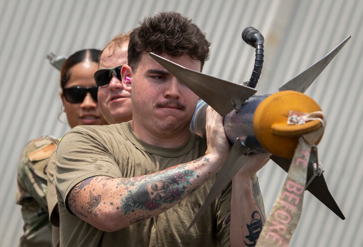 July Raptor weapons load competition