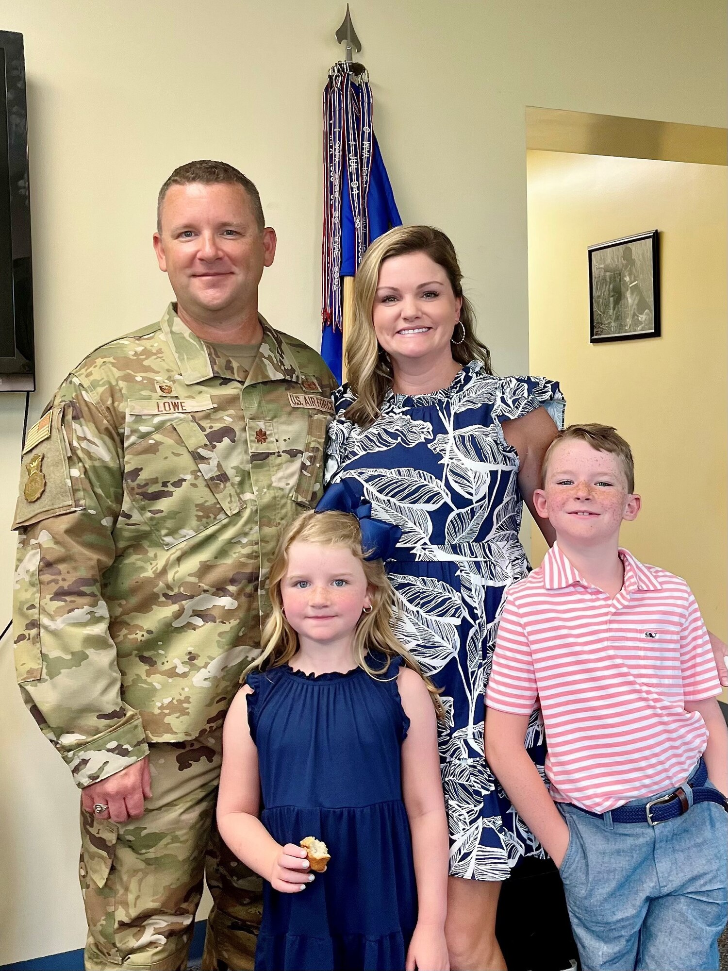 Maj. Lowe and his family pose for a photo