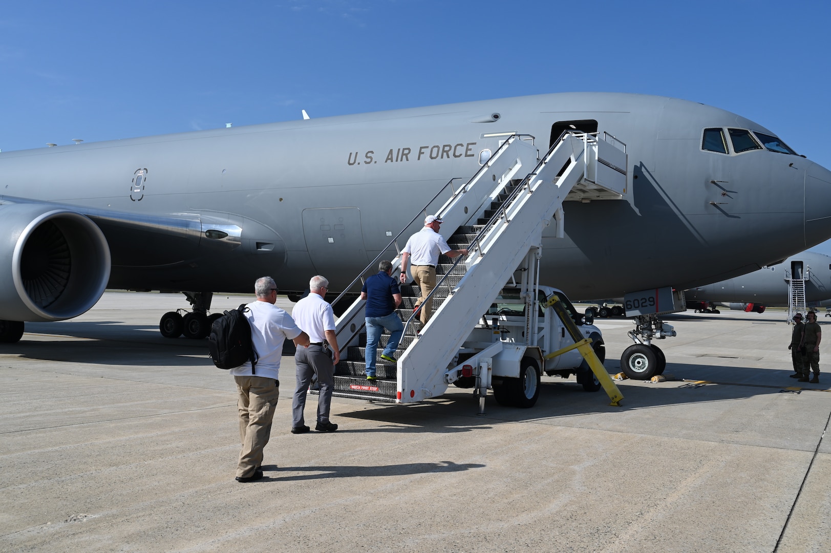 New Hampshire civilian employers board a Pease KC-46 Pegasus for a 'Boss Lift' to Fort Drum, New York, to watch a New Hampshire Guardsmen of 3rd Battalion, 197th field Artillery Regiment, train in the field July 21, 2022.