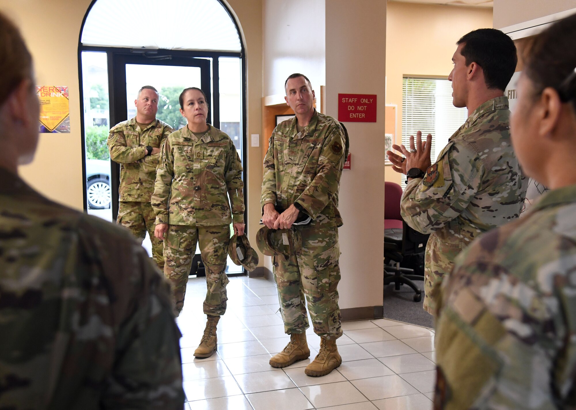 U.S. Air Force Master Sgt. Steven Coon, 81st Diagnostic and Therapeutics Squadron human performance training center program manager, briefs base leadership on the Human Performance Training Center capabilities at Keesler Air Force Base, Mississippi, July 25, 2022. The purpose of the center is to develop healthy and resilient Airmen that are always operational and maintain a high level of readiness by providing participants with the tools, resources and knowledge needed to create healthy and sustainable habits. (U.S. Air Force photo by Kemberly Groue)