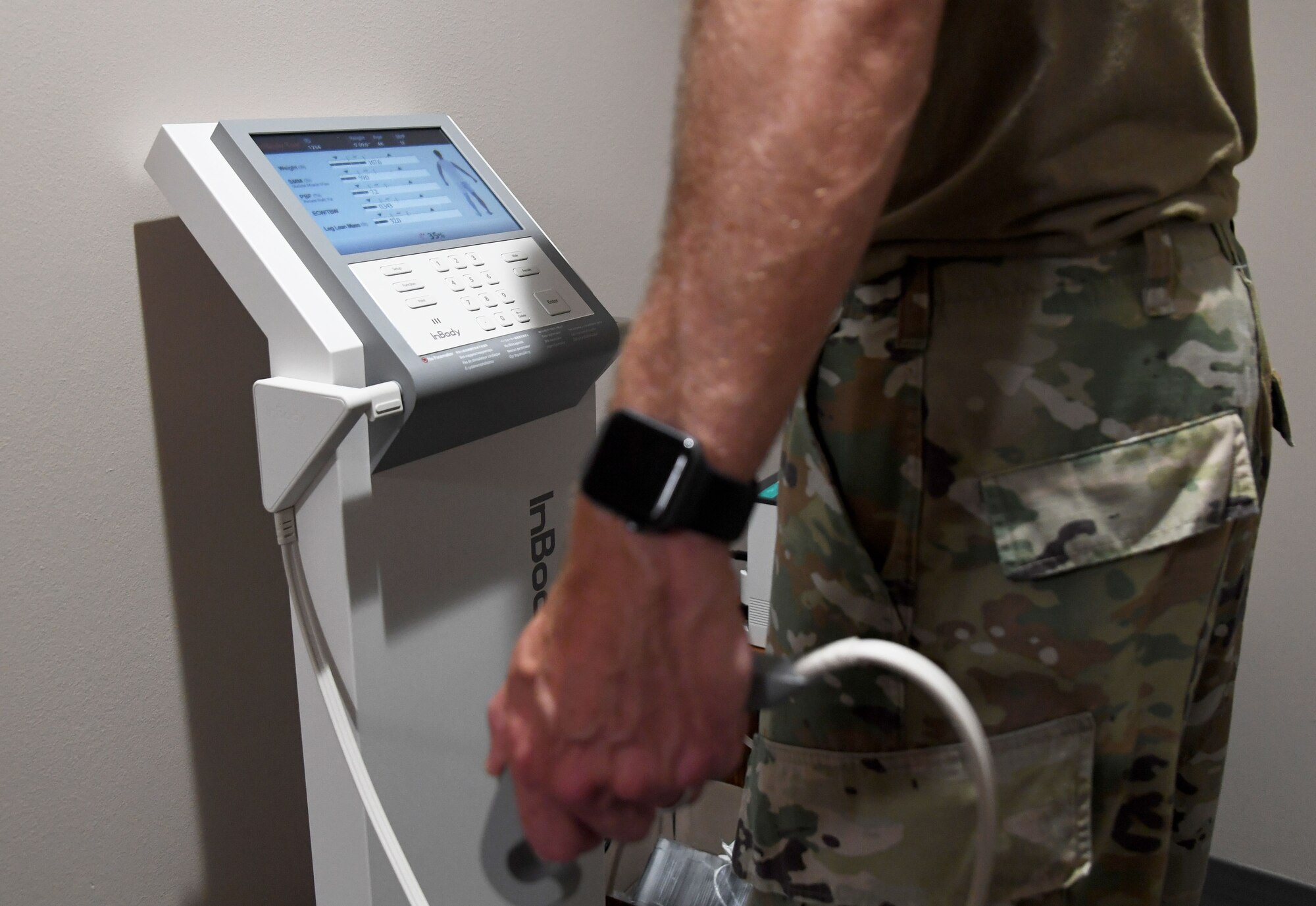 U.S. Air Force Col. Christopher Estridge, 81st Medical Group commander, uses the In Body 770 equipment to collect anthropometrics inside the Human Performance Training Center at Keesler Air Force Base, Mississippi, July 25, 2022. The purpose of the center is to develop healthy and resilient Airmen that are always operational and maintain a high level of readiness by providing participants with the tools, resources and knowledge needed to create healthy and sustainable habits. (U.S. Air Force photo by Kemberly Groue)