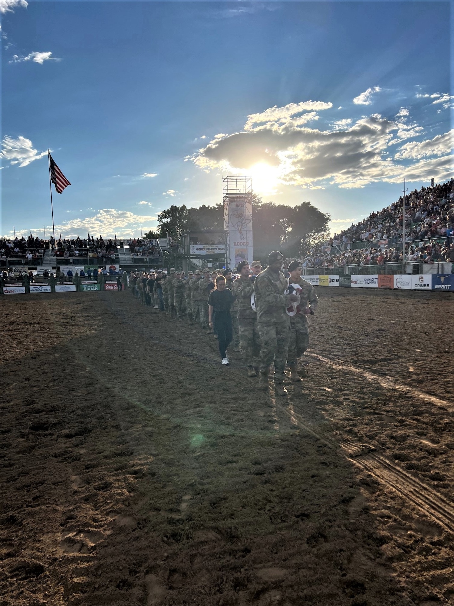 Patriots from Hill AFB joined other Utah service members and celebrated Patriot Night at the Ogden Pioneer Days Rodeo opening ceremony July 22, 2022, by transporting “The Major,” a giant American flag in Ogden, Utah
