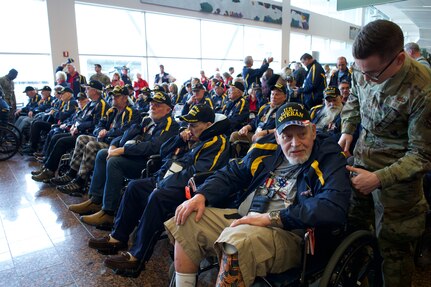 ANCHORAGE, Alaska - Joint Base Elmendorf Richardson service members meet with Honor Flight veterans April 30, 2022, at Ted Stevens Anchorage International Airport. The Honor Flight Network’s mission is to fly veterans to Washington D.C. to visit the memorials and monuments dedicated to their service. (Alaska Air National Guard photo by Maj. Chelsea Aspelund)