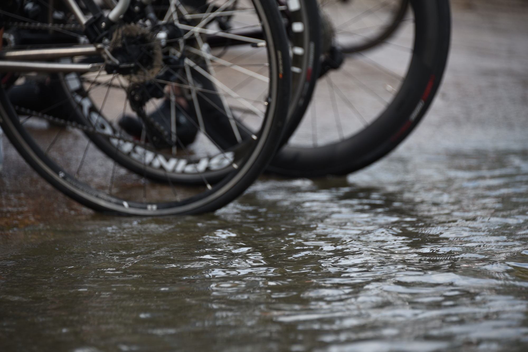 Bicycle tires are dipped into water