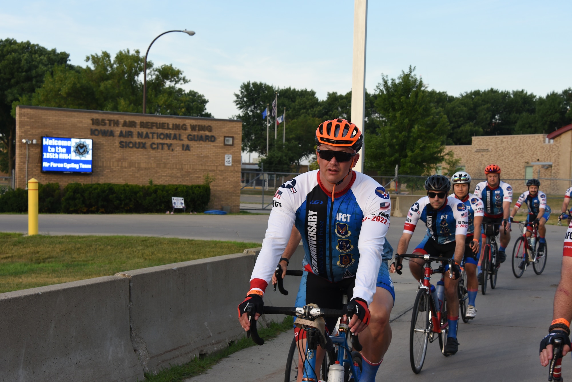 AFCT members ride by 185th ARW’s sign