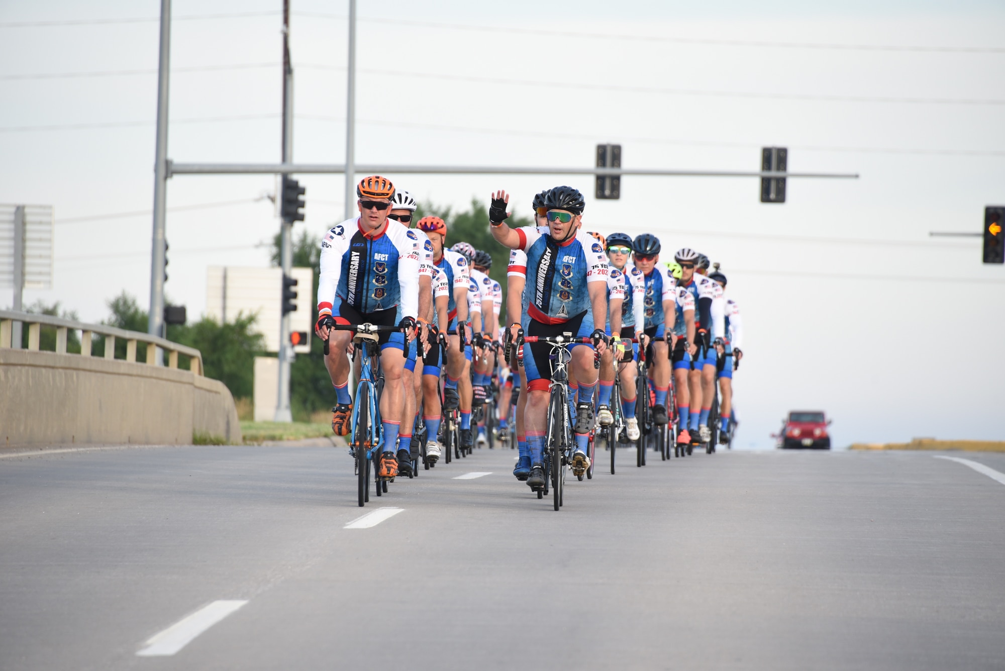 AFCT greet from formation while riding down a road