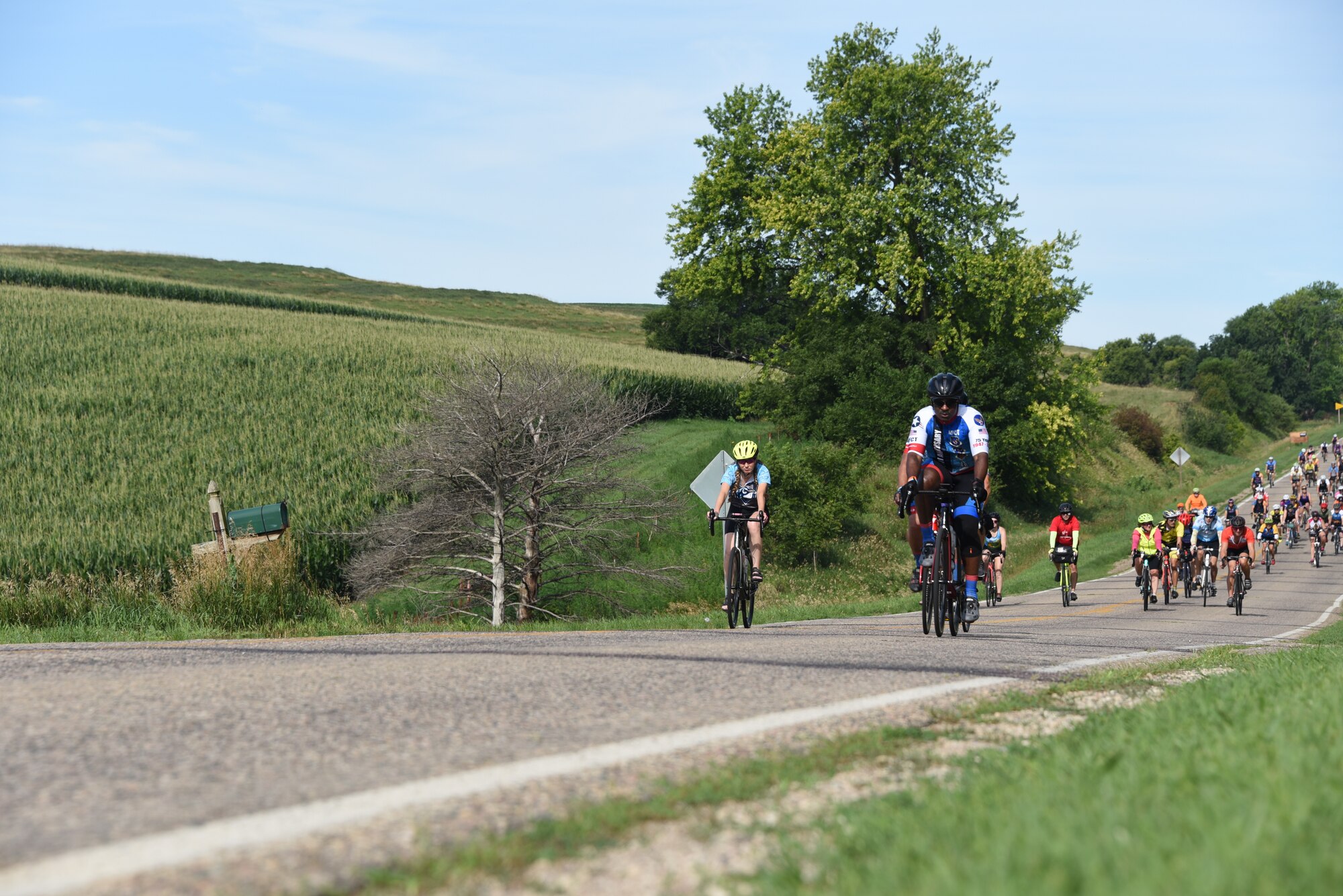 AFCT member rides in front of a crowd