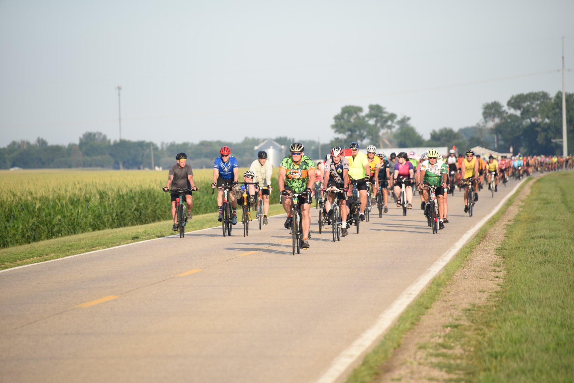RAGBRAI cyclists ride down the road