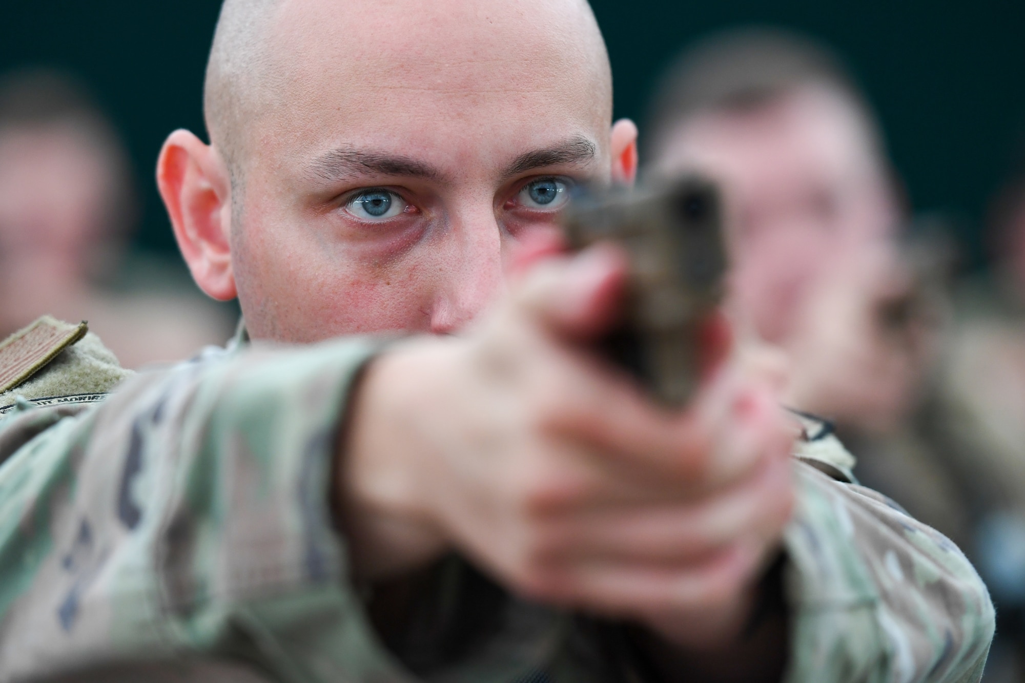 Airman aims weapon